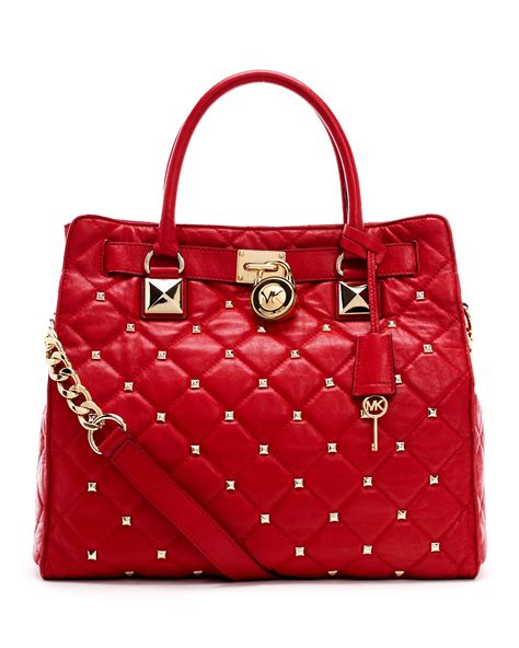 michael kors red purses.